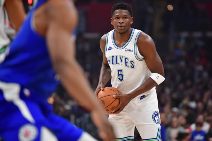 Feb 12, 2024; Los Angeles, California, USA; Minnesota Timberwolves guard Anthony Edwards (5) controls the ball against the Los Angeles Clippers during the first half at Crypto.com Arena.